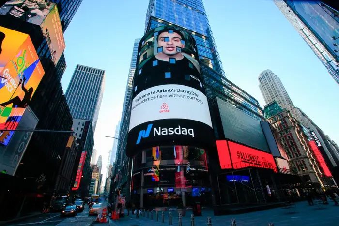 The Airbnb logo displayed on the Nasdaq billboard in Times Square during its Wall Street debut nearly three years ago.